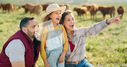 Image of Happy family bonding on a cattle farm, happy, laughing and learning about animals in nature. Parents, girl and agriculture with family relaxing, enjoying and exploring the outdoors on an open field