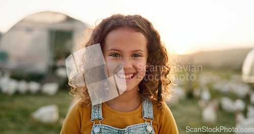 Image of Chicken, smile and girl on a farm learning about agriculture in the countryside of Argentina. Happy, young and sustainable child with an animal, bird or rooster on a field in nature for farming