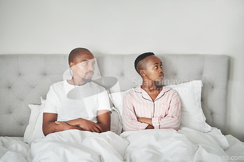 Image of Stress, fight and black couple lying in bed angry, affair and divorce argument or insomnia. Mental health, relationship and depression, woman ignoring man frustrated with sexual problem in bedroom.