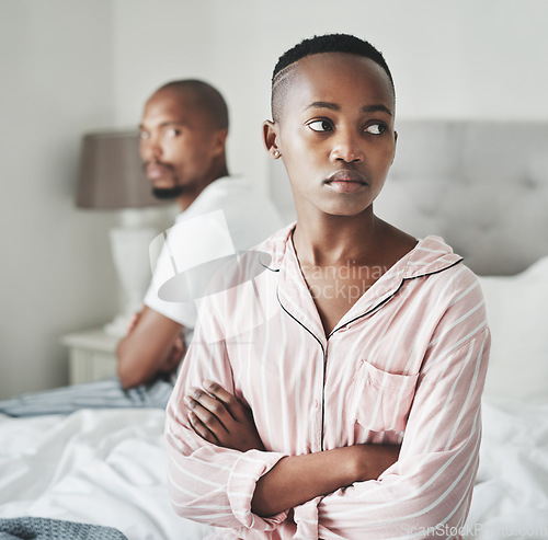 Image of Stress, depression and marriage, black couple on bed in home angry after argument or fight. Mental health, relationship and divorce problem, woman and man frustrated and depressed in bedroom thinking