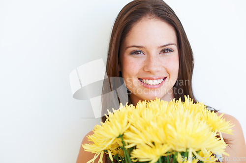 Image of Flower bouquet, portrait and happy studio woman with floral product, sustainable gift or yellow spring present. Mockup face, advertising space and eco friendly model girl isolated on white background