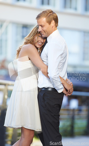 Image of Love, couple and hug outdoor, city and happiness for Valentines day, dating and cheerful together. Romance, man and woman embrace in town, celebrate relationship and happy with hope and marriage