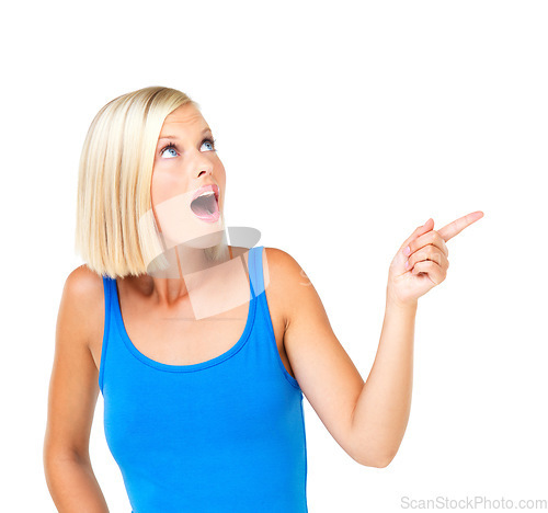 Image of Shocked woman and pointing for space, product placement and discount girl isolated on white studio background. Young female, lady and gesture for choice, sales and advertising for deal and surprised