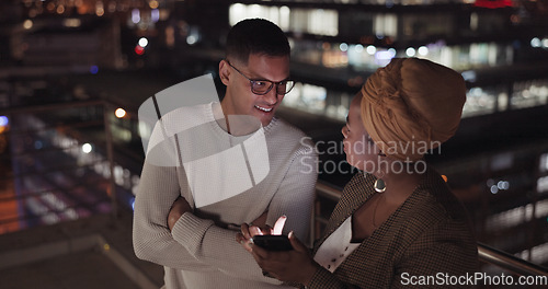 Image of Night, man and black woman with smartphone, connection and social media outdoor. Latino male, Nigerian female and cellphone for communication, share ideas and discussion late evening or online search