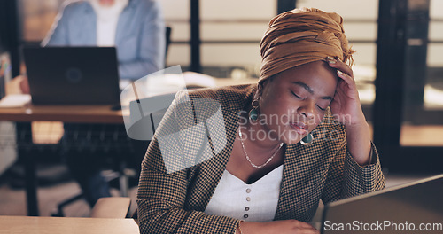 Image of Business, stress and black woman in office, night and overworked. African American female, employee and administrator with depression, tired and burnout for deadline, online schedule and anxiety.