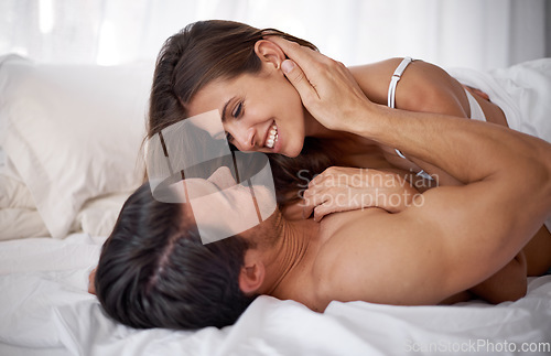 Image of Bedroom love, morning and happy couple relax for calm peace, bonding and quality time together in Lisbon Portugal. Eye contact, vacation and romantic people on hotel bed for Valentines Day holiday