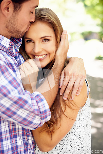 Image of Couple, portrait or forehead kiss hug in garden, nature or park on valentines day date, romance or bonding love. Smile, happy woman or man in embrace, relax support or partnership for profile picture