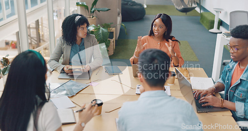 Image of Laptop, digital marketing or creative employees in a meeting planning SEO strategy, advertising or branding on website. Collaboration, team work or young people working on a startup or group project