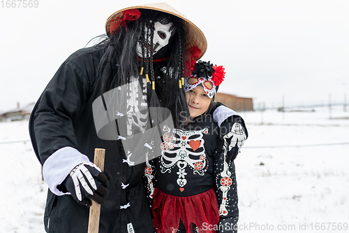 Image of Peoples in mask attend Masopust or the Mardi Gras carnival, traditional ceremonial door-to-door procession. 