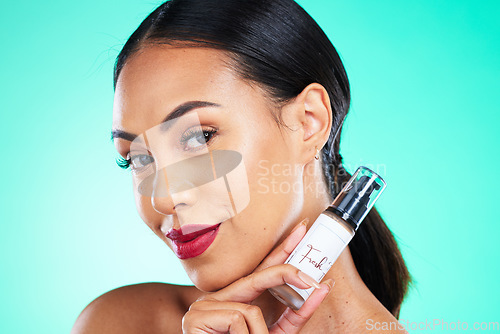 Image of Beauty, cosmetic and portrait of a woman in studio with facial serum for skincare treatment. Cosmetics, face and female model from Mexico with natural makeup routine isolated by turquoise background.