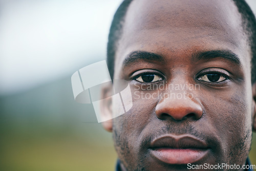 Image of Portrait, sports and coach by man on a field for fitness, exercise and training with blurred background mock up. Face, mindset and personal trainer outdoors for workout, performance and match