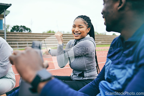 Image of People, fitness and stretching for sports exercise, workout or training together on the stadium track. Black woman and friends in warm up stretch getting ready for athletics sport, running or race