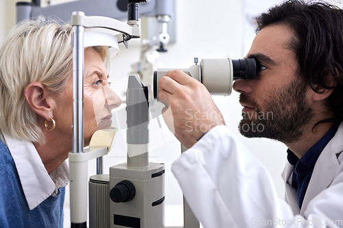 Image of Optometry, machine exam and woman with an optometrist for a vision check, eye consultation and test. Healthcare, help and male optician with a senior patient to measure visual eyesight with equipment