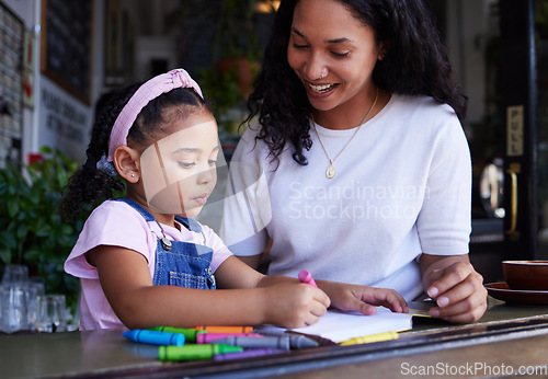 Image of Bonding, drawing and mother and child at a restaurant with art, creativity and color on paper. Creative, happy and girl learning to draw with her mom while eating at a cafe and waiting for food