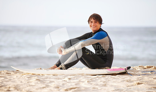 Image of Happy, surfing and portrait of a man at the beach for water sports, happiness and holiday in Bali. Smile, training and surfer with a board for exercise, ocean break and activity on a vacation