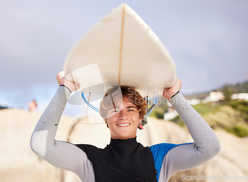 Image of Beach, surfing and portrait of a man with a board for start of summer, fitness and relaxation. Exercise, smile and young surfer ready for training at the sea in the ocean on a holiday in Thailand