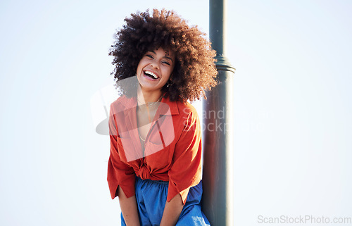 Image of Happy woman, outdoor portrait and fashion on a blue sky background with summer mock up space. Face of beauty model person with natural hair, happiness and unique style for freedom and cosmetics
