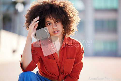 Image of Portrait of black woman with afro, urban and fashion for trendy gen z style and attitude in summer weekend. Beauty, city lifestyle and funky girl with serious face and hip hop streetwear in Brazil.