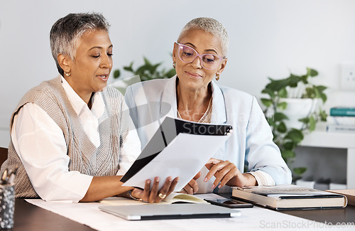 Image of Collaboration, documents and meeting with a business team planning while working together in an office. Teamwork, strategy or partnership with a female employee and colleague at work for growth