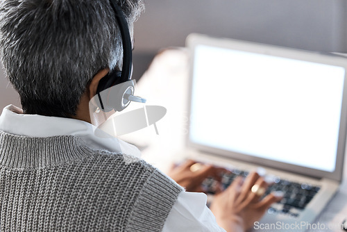 Image of Call center, customer support and back of woman with laptop typing report, client review and feedback. Telemarketing, crm company and senior worker on computer for help, advice and hotline service