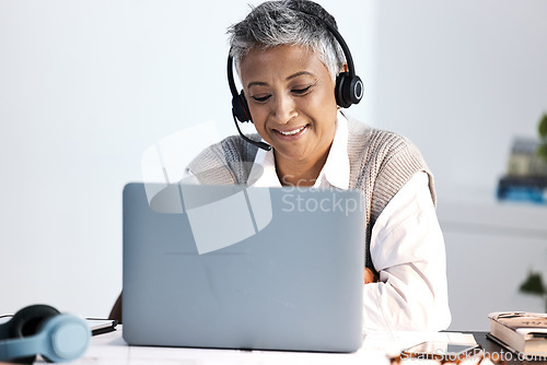 Image of Call center, laptop and consulting with business woman talking for telemarketing, customer service and contact us. Trust, sales and crm with senior employee at help desk for technical support