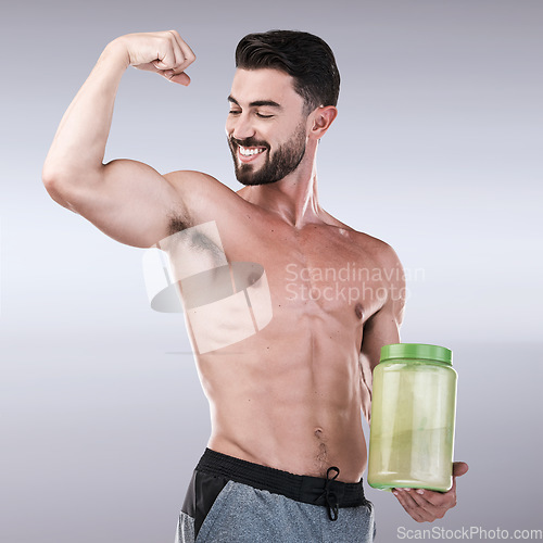 Image of Protein shake, fitness and muscle with portrait of man for workout, health and bodybuilder. Diet, gym and training with athlete and powder for sports, exercise and nutrition in gray studio background