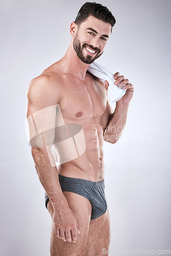 Image of Fitness, body and beauty man isolated on a white background for exercise, aesthetic and muscle goals. Underwear, sexy bodybuilder or sports person portrait in health, wellness and workout abs success