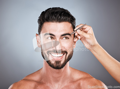 Image of Face, salon and man with tweezers in studio isolated on a gray background for wellness. Thinking, hair removal and male model with facial product to pluck eyebrows for grooming and beauty with barber