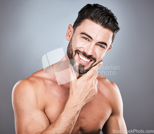 Image of Skincare, beard and facial, portrait of man with smile, hands on face and hair or beauty maintenance. Fitness, health and spa facial care, male model with muscle in studio isolated on grey background