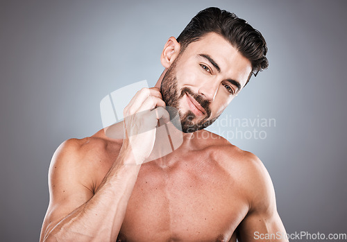Image of Skincare, beard care and portrait of man with smile, hands on face and hair maintenance. Fitness, healthy spa facial care and happy male model with strong muscle in studio isolated on grey background