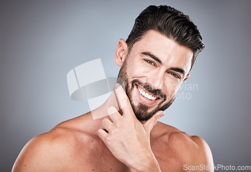 Image of Skincare, teeth and health, portrait of man with smile, hands on face and beard or dental maintenance. Fitness, spa facial care, happy male model with muscle in studio isolated on grey background.