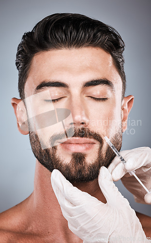 Image of Face injection, man and plastic surgery for skincare, collagen and beauty clinic in studio. Cosmetics, needle and male aesthetic for body transformation, botox change and facial prp on background