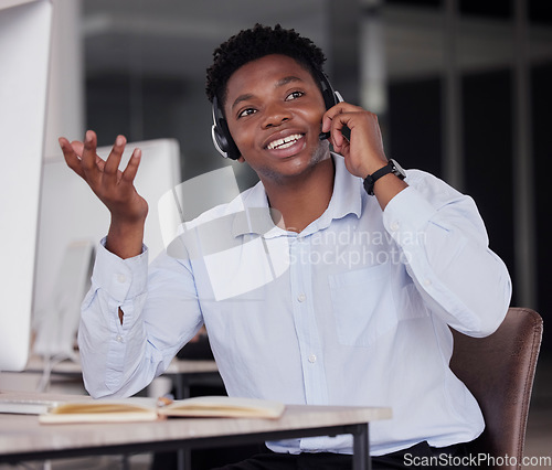 Image of Call center, black man and communication for customer service, telemarketing and crm help desk in office. Sales agent, consultant and tech support for questions, lead generation or telecom consulting