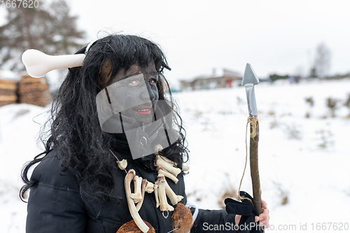 Image of Peoples in mask attend Masopust or the Mardi Gras carnival, traditional ceremonial door-to-door procession. 