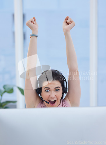 Image of Success, winner or woman in call center excited with telemarketing sales target or goals with fists up. Wow, CRM communication or happy consultant celebrates winning an achievement or bonus deal