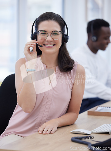 Image of Call center, portrait and friendly woman for telemarketing sales, customer services or virtual consulting smile. Telecom, technical support or ecommerce consultant, agent or help desk worker talking