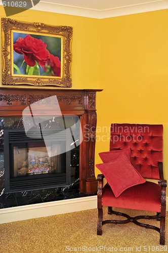 Image of Fireplace and red chair