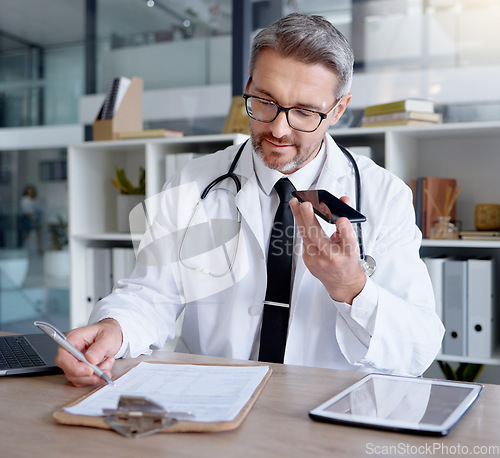 Image of Mature doctor, phone call or hospital clipboard in telehealth consulting, prescription help or test results communication. Talking man, healthcare or mobile technology, paper documents or networking