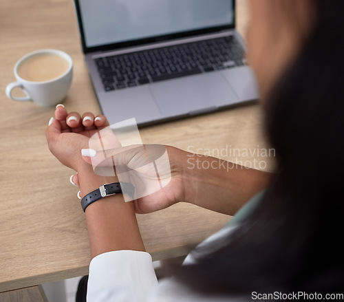 Image of Woman in the office with wrist pain, injury or arthritis while working on a project with a laptop. Business, professional and female employee with a hand bruise, inflammation or fracture in workplace