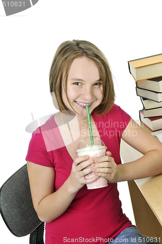 Image of Teenage girl with milkshake