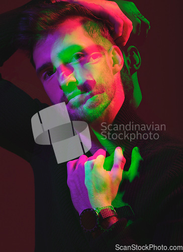 Image of Double exposure, futuristic and portrait of a man in color isolated on a dark background in studio. 3d, art and model in creative, neon and aesthetic lighting with overlay on a black backdrop