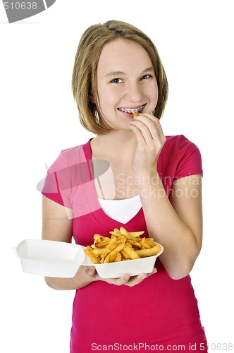 Image of Teenage girl with french fries