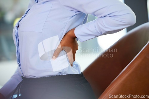 Image of Back pain, stress and business woman with muscle injury, health risk and fatigue in chair. Closeup of uncomfortable employee with spine problem, bad posture and stretching injured body in workplace