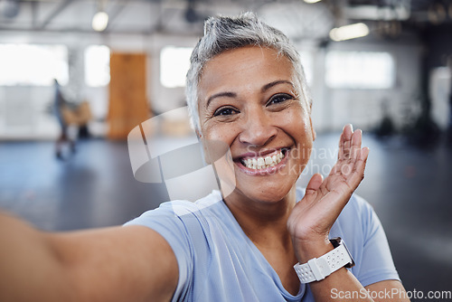 Image of Selfie, gym and fitness senior woman taking picture after exercise, workout or training with a smile. Elderly, old and portrait of a fit female happy for wellness, health and update social media