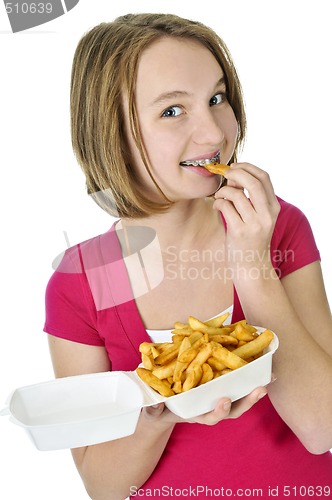 Image of Teenage girl with french fries