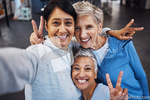 Image of Fitness women, portrait or peace sign selfie in gym, workout or training for healthcare wellness or bonding exercise. Happy smile, comic or mature sports in diversity friends group or community fun