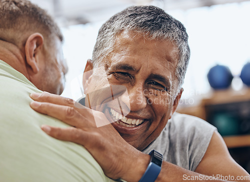 Image of Friends, fitness and man with personal trainer in gym for teamwork, support and motivation for workout. Sports, retirement and face of senior male hug ready for exercise, training and cardio wellness