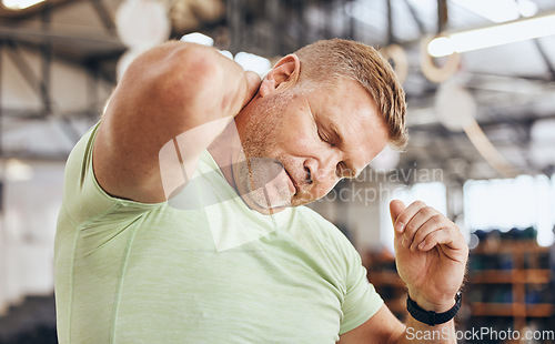 Image of Accident, fitness and man with neck pain from training, gym stress and burnout from body building. Tired, mistake and bodybuilder with a spine or muscle injury after exercise, workout or cardio