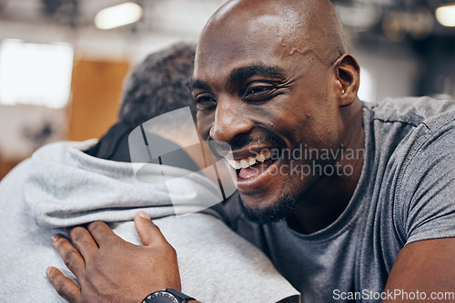 Image of Black man, friends and hug in fitness for exercise, workout or training class together at the gym. Happy African American male hugging friend in celebration for healthy wellness or cardio achievement