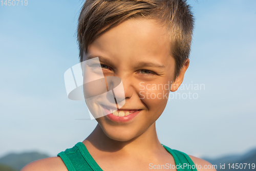 Image of Closeup portrait of a boy in summer day.